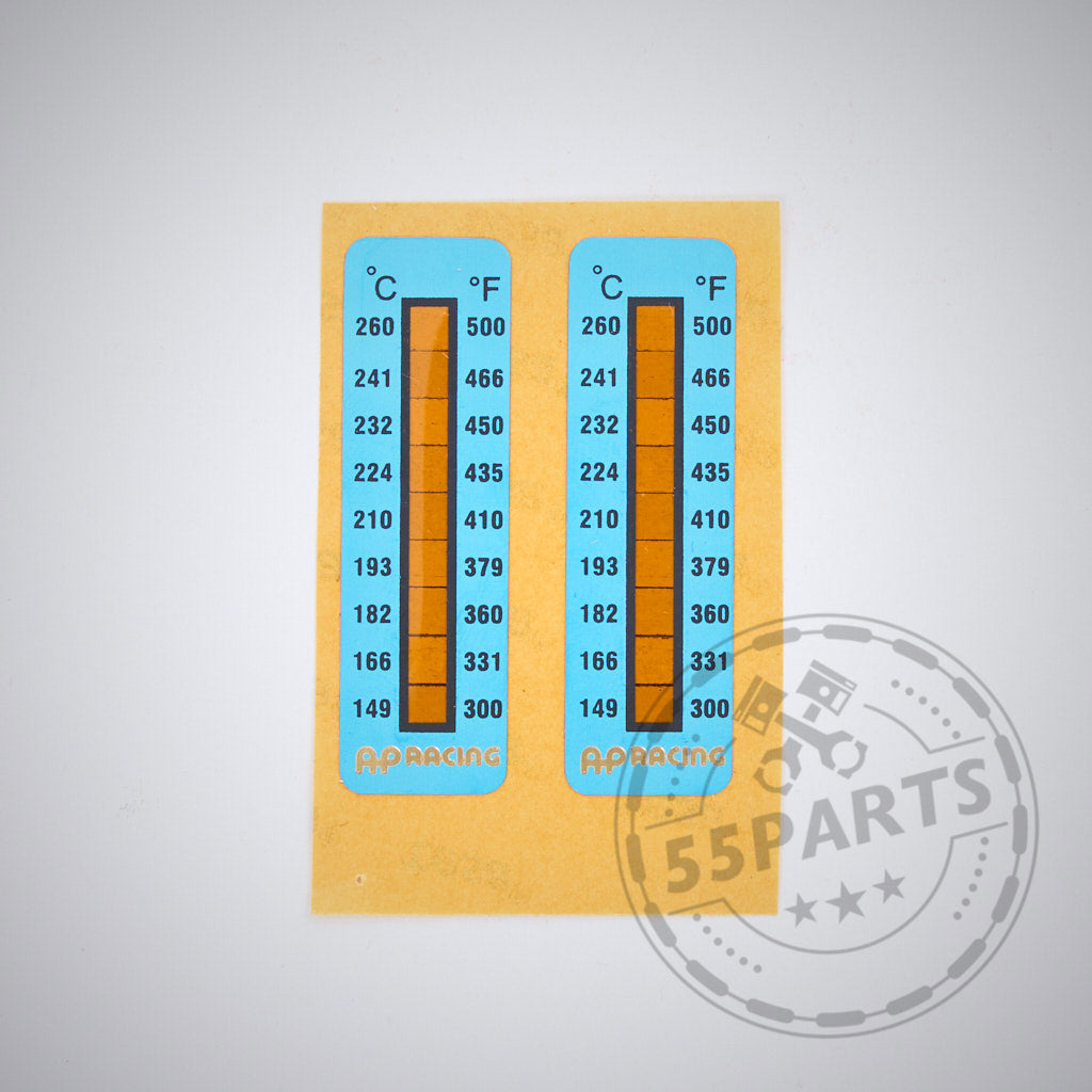 Der 55Parts Special: AP-Racing Temperatur Messstreifen für Bremssattel von 55Parts zeigt Celsius und Fahrenheit auf gelbem Hintergrund an - perfekt für die Temperaturüberwachung im Motorsport. Das Set enthält zwei blaue Streifen.