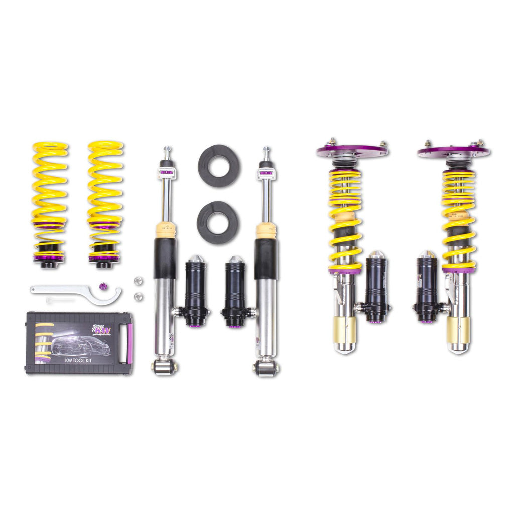 Das KW Gewindefahrwerk V3 Clubsport inkl.. Stützlager für BMW 1er F20/F21, 2er F22, 3er F30 und 4er F32 mit gelben Federn, Dämpfern und Werkzeugen auf weißem Grund für Top Fahrdynamik Optimierung und Tieferlegung.