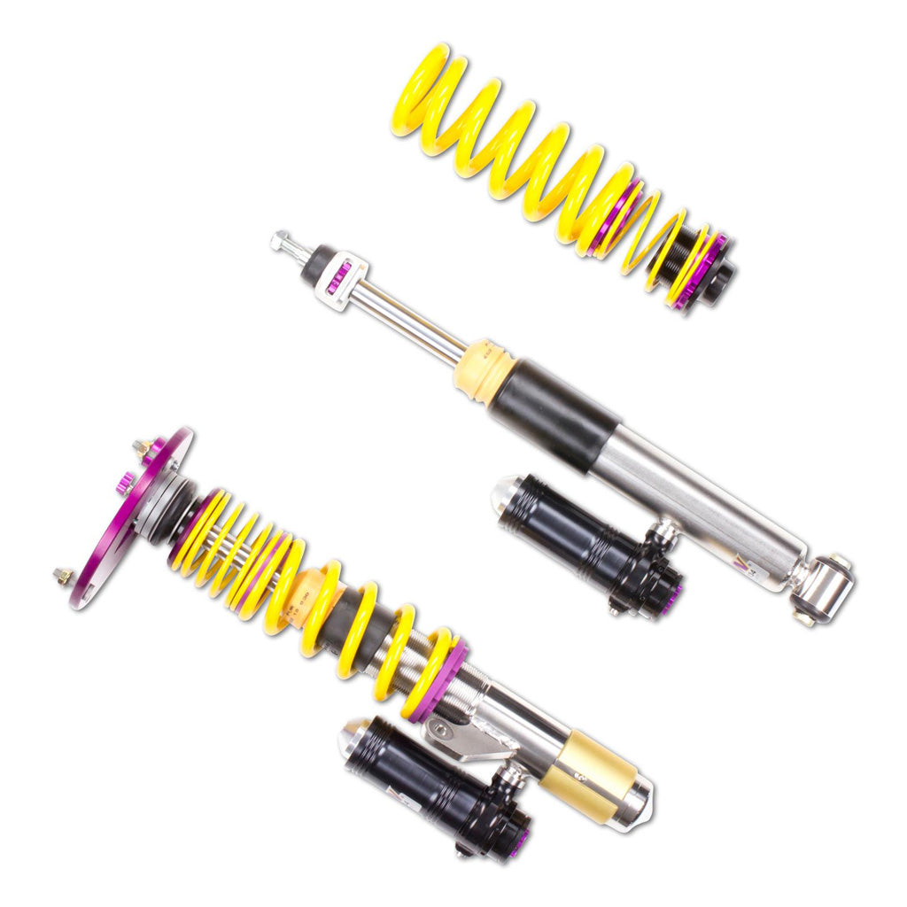 Die KW Gewindefahrwerk V3 Clubsport Gewindefahrwerke, inklusive Top Mounts, passen für BMW 1er F20/F21, 2er F22, 3er F30 und 4er F32. Abgebildet mit gelben Federn und Metalldämpfern auf weißem Grund.