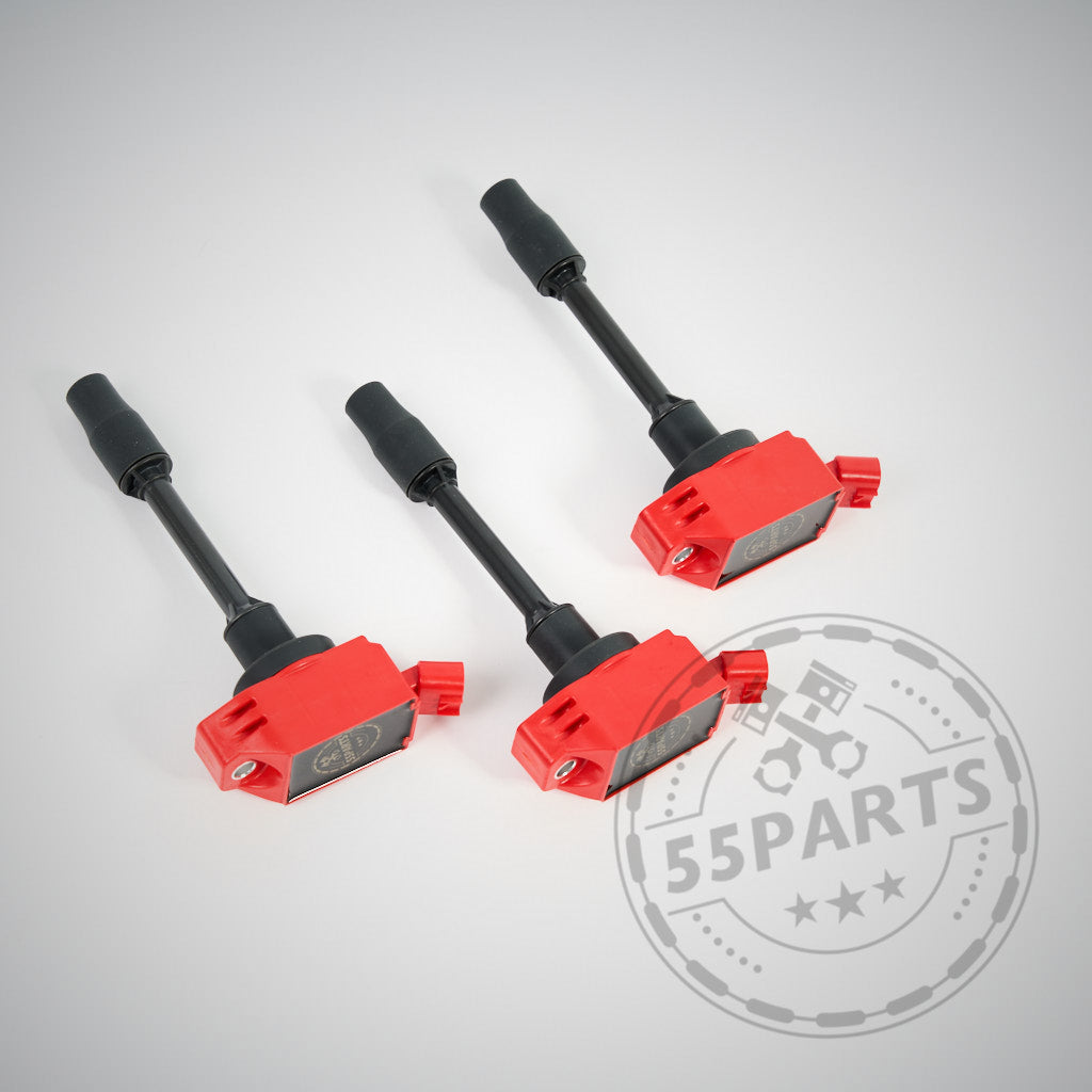 Drei rote 55Parts Special Zündspulen passend für Toyota Yaris GR sind diagonal auf einem hellen Hintergrund angeordnet und betonen so ihr Leistungssteigerungspotential für Ihren Toyota Yaris GR.