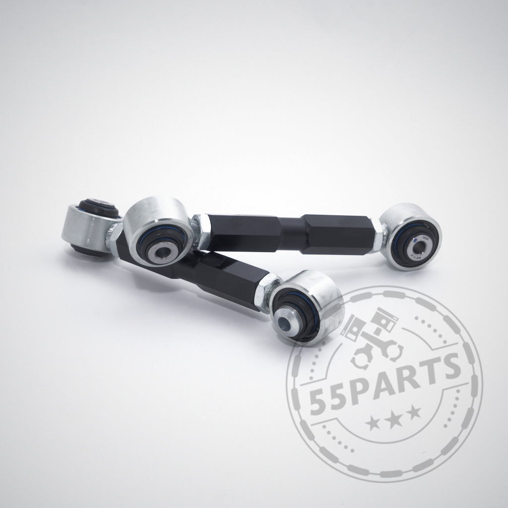 Zwei schwarz-silberne 55Parts Exclusive Uniball Lenker Sets Hinterachse passend für BMW 1er E8x, 1er M Coupé und 3er M3 E9x mit Achslagerungen werden auf weißem Hintergrund mit einem 55Parts-Wasserzeichen angezeigt.