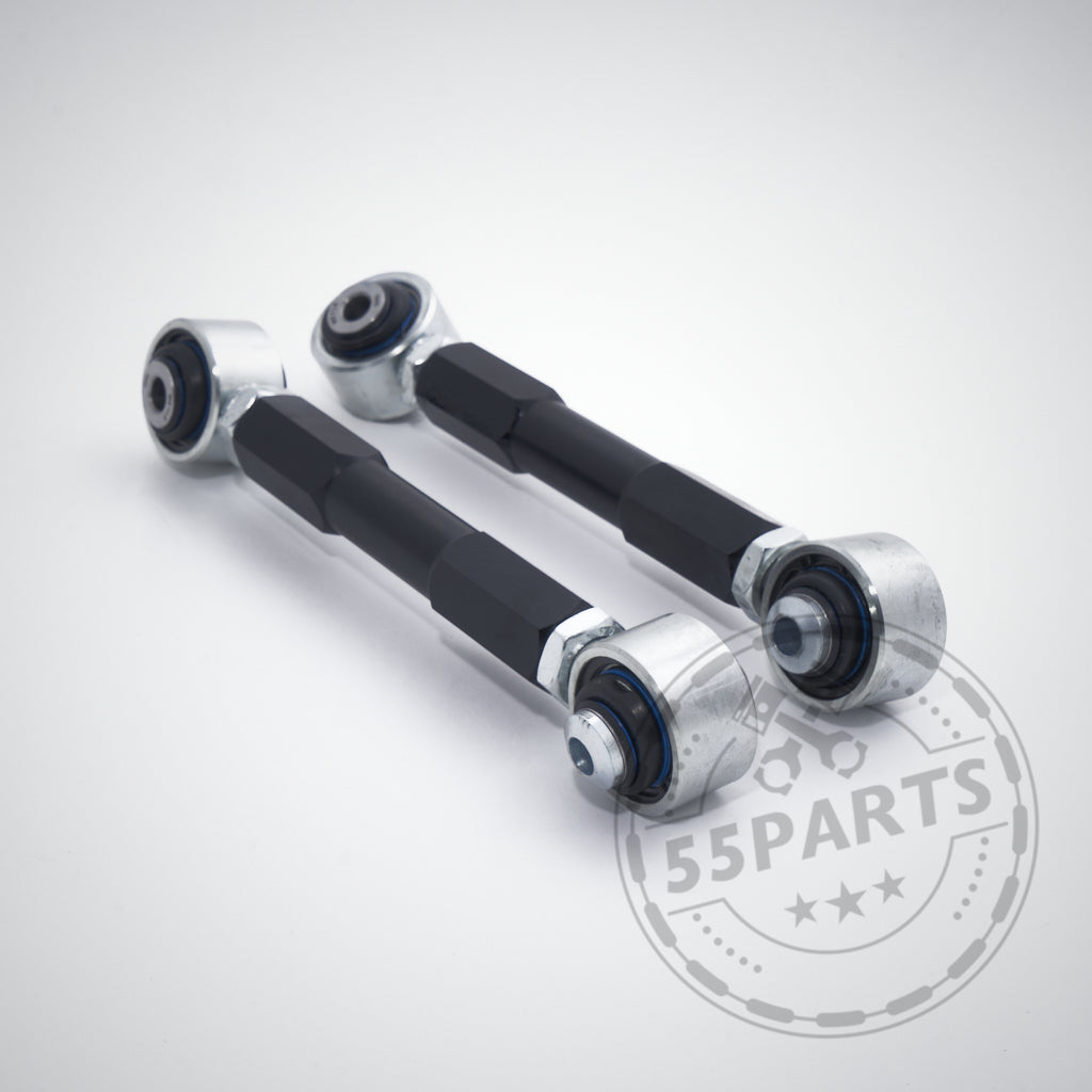 Auf hellem Hintergrund mit Wasserzeichen sind zwei 55Parts Exclusive Uniball Sturzlenker-Hinterradlenker passend für BMW 1er E8x, 1er M Coupé und 3er (M3) E9x abgebildet.