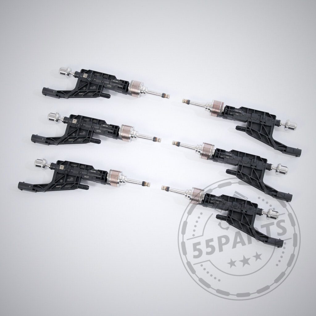 Sechs schwarz-silberne S58 Injektoren für B58 Gen 2 - 30% Upgrade, passend für G-Serie 40i und Toyota Supra, sind in parallelen Reihen auf hellem Grund angeordnet.
