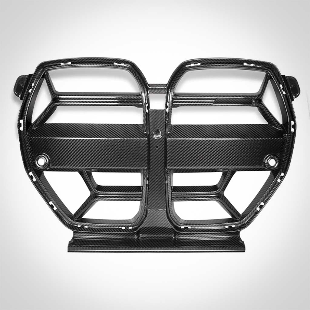 Twistnfix TNF+ CSL Style Carbon Grill passend für BMW M3 (G80/G81) und M4 (G82/G83) inkl. Teilegutachten, mit Doppelniere-Design auf weißem Hintergrund.