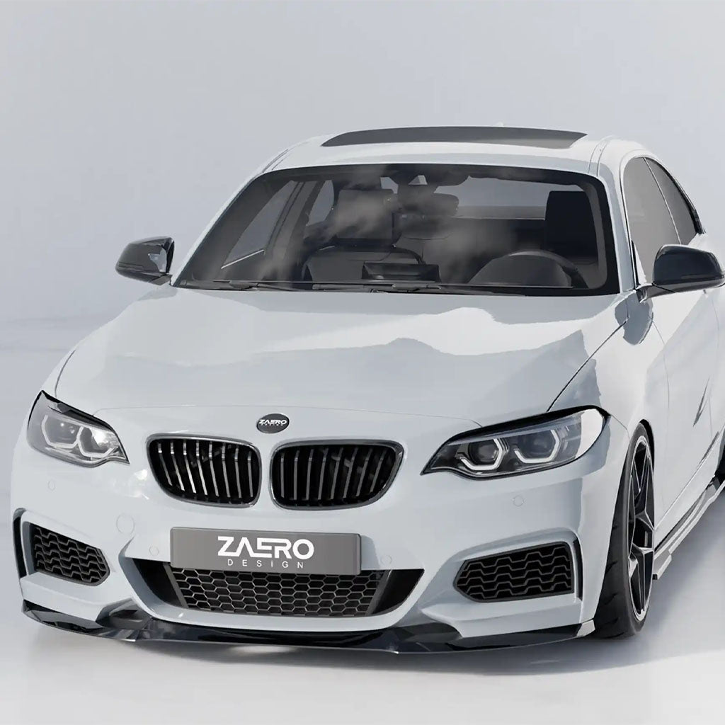 Weißer Sportwagen mit einer ZAERO Design EVO-1 Frontlippe für BMW F22/F23, von vorne gesehen vor einem schlichten Hintergrund.