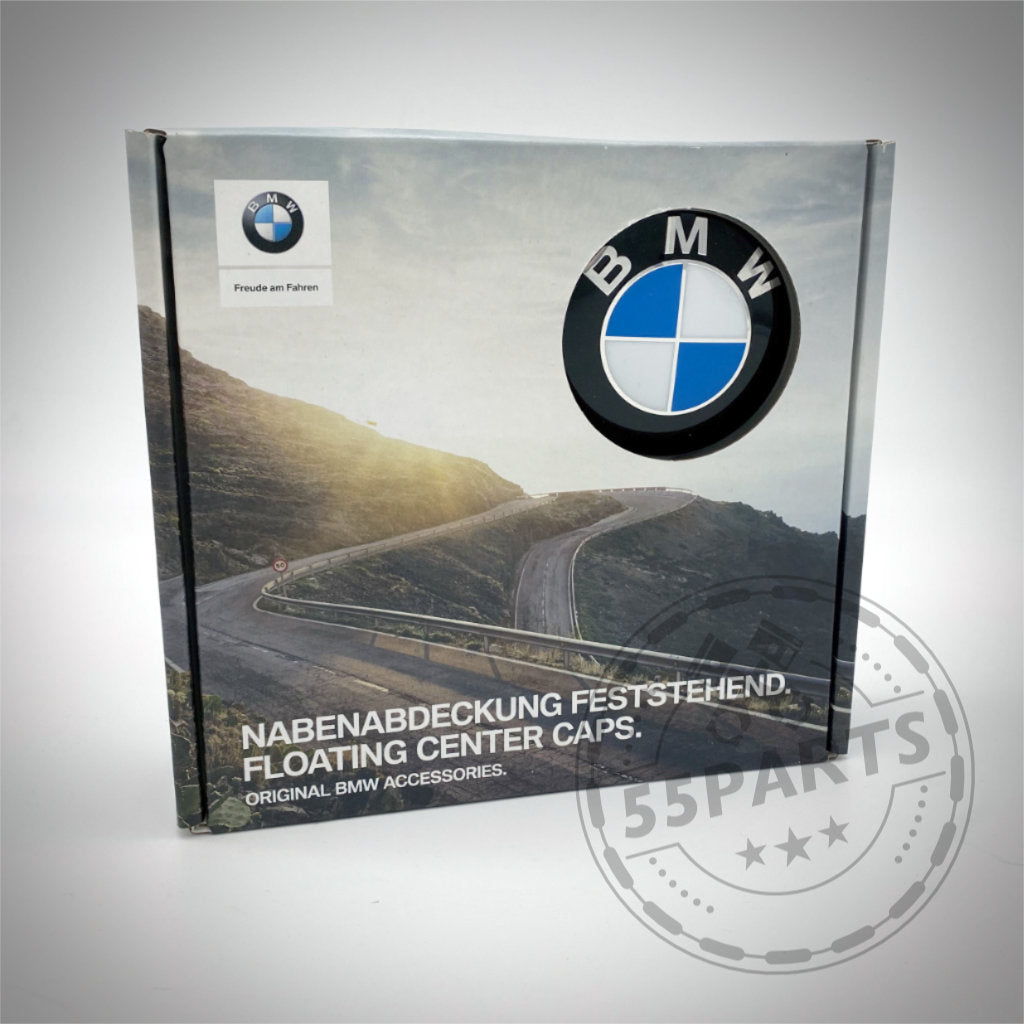 55Parts Original BMW Nabenabdeckung feststehende Box zeigt eine kurvenreiche Bergstraße und das BMW Logo auf der Vorderseite der Verpackung.